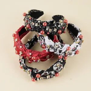 Halloween knot headbands featuring rhinestone spider webs, skulls, and pearls set