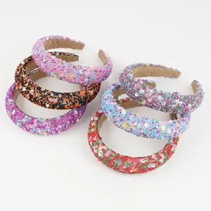 Macro shot of colorful beaded headbands with sparkling sequins and anti-slip lining