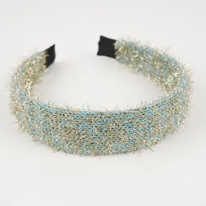 Sparkly gold feather knit wide headband in elegant blue finish for women hair styling