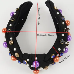 Detail showing dimensions of black knotted headband with colorful pearls and rhinestones