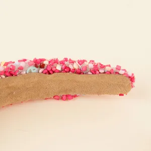 Serre-tête rembourré avec perles roses et blanches et doublure en tricot marron