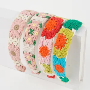 Set of four handmade crochet flower headbands in various vibrant colors for women