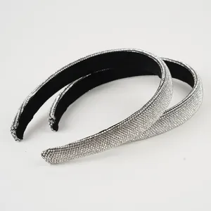 Sparkling rhinestone padded headband set with silver crystals and soft black velvet lining