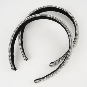 Set of two sparkly rhinestone padded headbands with elegant black velvet finish