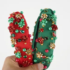 Red and green Christmas headbands featuring colorful beads and knotted fabric design