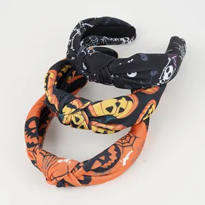 Halloween knot headbands set featuring skull and pumpkin patterns on fabric