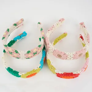 Handmade crochet floral headbands set in various colors with vintage knit texture