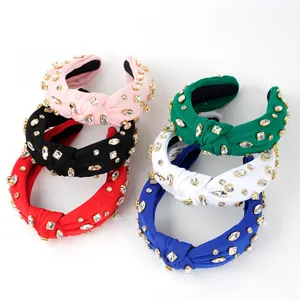 Luxe knotted headbands with shiny rhinestones in multiple colors for party hair styling