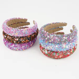 Detail of colorful handmade beaded headband with sequins and a soft suede lining