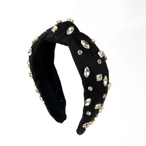 Sparkling rhinestone knotted headband in black fabric for a luxurious hair accessory style