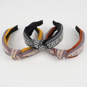 Three-piece set of wide knotted headbands with vintage ethnic embroidery patterns