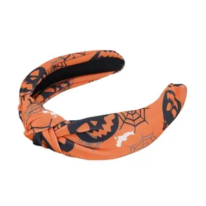 Halloween knot headband with orange pumpkin, spider web and bat prints for party wear