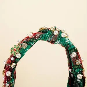 Christmas headband with red and green plaid fabric, pearls, rhinestones, and snowflakes