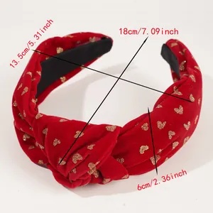 Detailed dimensions of the red velvet headband with gold heart pattern and bow design