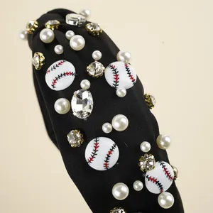 Detail of black sports headband featuring pearls, rhinestones and baseball themed beads