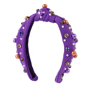 Sparkly Halloween knotted headband with purple fabric, colorful pearls and rhinestones