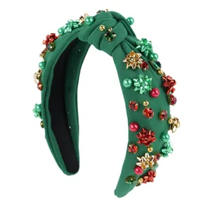 Forest green Christmas knotted headband with festive rhinestones, pearls and golden bows