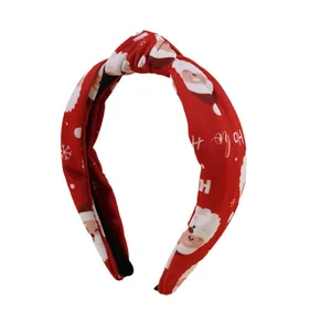 Serre-tête de Noël rouge avec nœud et motifs Père Noël pour décoration de fête festive