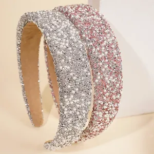 Sparkly wide rhinestone and pearl padded headband in silver and pink for women