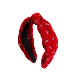 Red velvet headband with silver bow sequins and classic knotted design for women