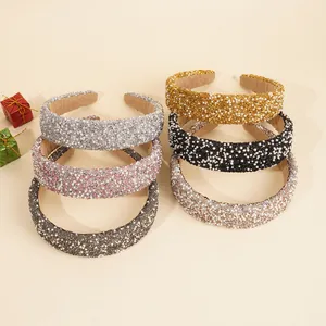 Detail of velvet-padded headbands with sparkling rhinestones and white pearls in six colors