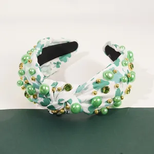Serre-tête Saint-Patrick avec imprimé trèfles, perles vertes et nœud tendance
