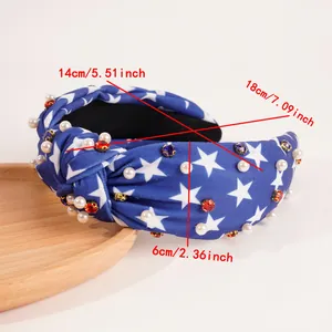 Detail of star pattern fabric headband with pearls and rhinestones showing dimensions