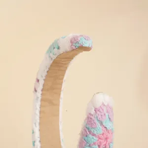 Ethnic knit headband with pastel floral crochet pattern and non-slip sponge lining