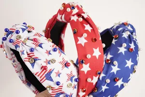 Macro detail of knotted headbands with patriotic stars, stripes, pearls and rhinestones