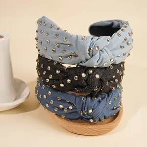 Knotted denim headband with sparkling rhinestones in blue and black colors