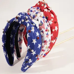Detail of USA flag style headbands with pearls, rhinestones and knotted fabric design