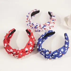 Detail view of American flag knot headbands with pearls, rhinestones and stars