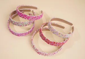 Detail view of colorful beaded headbands with non-slip fabric lining in set of six