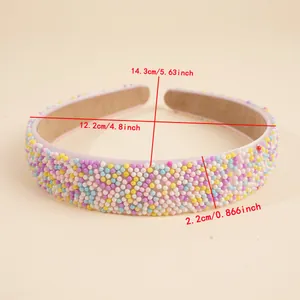 Detailed view of colorful beads on headband with dimensions 14.3cm by 12.2cm