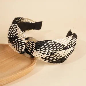 Bohemian woven raffia headband with twisted knot and amber acrylic ring accent