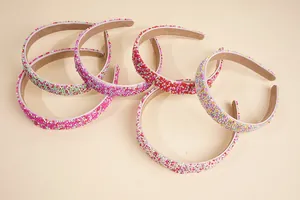 Detail showing five colorful beaded headbands in sweet candy style with fabric lining