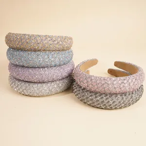 Sparkling padded headband with multi-color rhinestones and high top fashion design