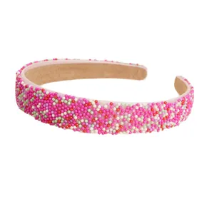 Pink fashion headband with colorful pearls and non-slip lining for women's hair styling