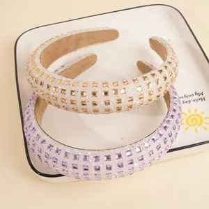 Sparkly sponge headbands set with gold and purple square rhinestones on wide padded band