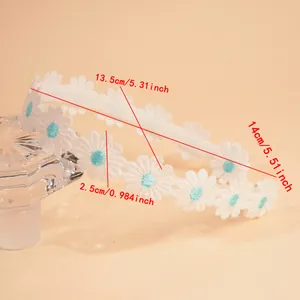 Detail view of white lace daisy headband with precise 14cm and 13.5cm sizing measurements