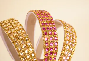 Close-up of luxury rhinestone headbands with square-cut crystals in multiple colors
