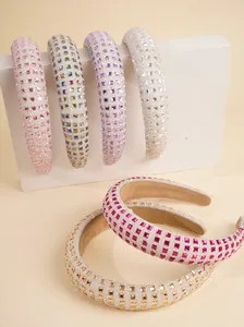 Detailed close-up of sponge headbands with four rows of sparkling square rhinestones