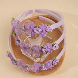 Three-piece purple headband set for girls with lace butterflies and 3D fabric flowers