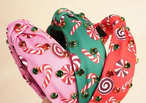 Detail of Christmas knot headbands with candy prints and sparkling rhinestones