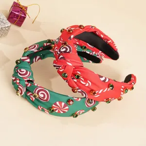 Padded knotted Christmas headband with festive candy print and sparkling rhinestones