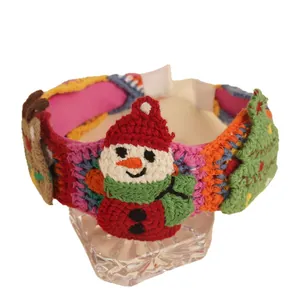 Handmade crochet Christmas headband with snowman, reindeer and festive tree patterns