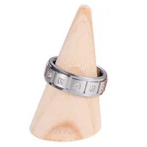 Detailed macro view of men's brushed tungsten steel ring with square set cubic zirconia