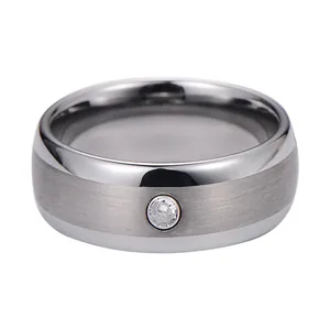 Mens silver tungsten ring with brushed surface and centered zircon stone setting