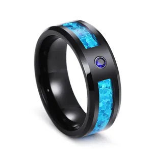Polished black tungsten ring with blue opal inlay and central blue sapphire for men