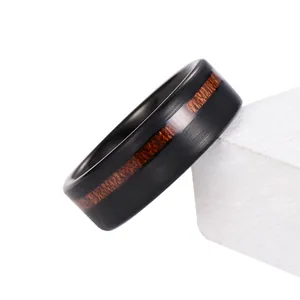 Black brushed tungsten ring for men featuring an elegant 8mm walnut wood inlay